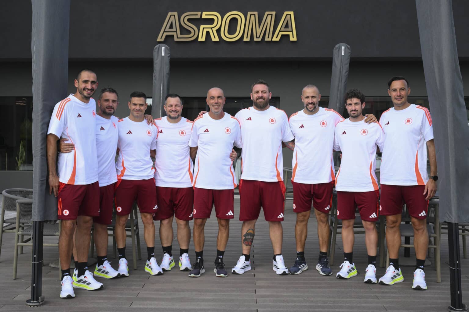 De Rossi e lo staff della Roma