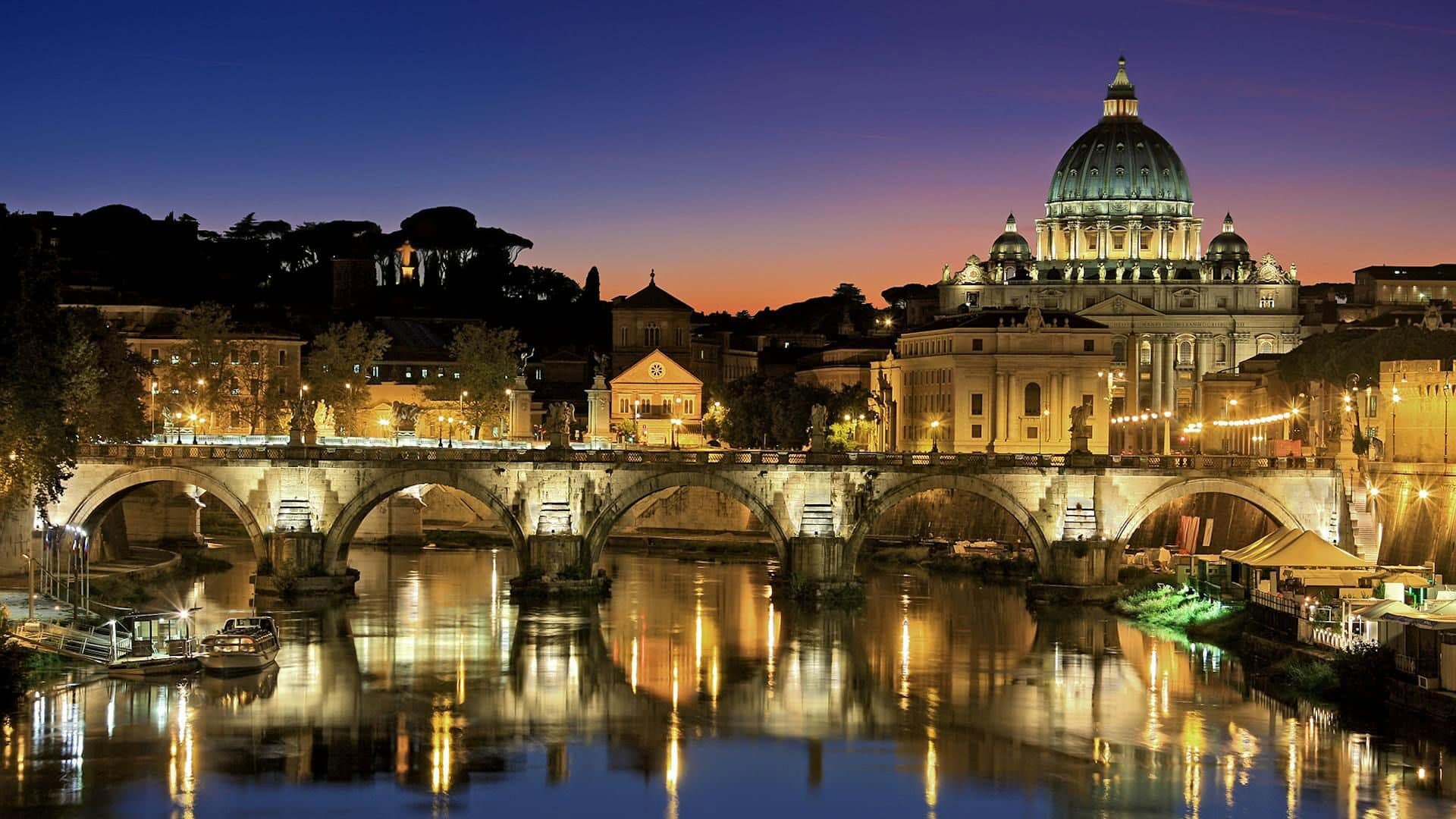 Roma di sera: luci sul Tevere e vista su San Pietro, weekend di eventi il 21 e 22 giugno
